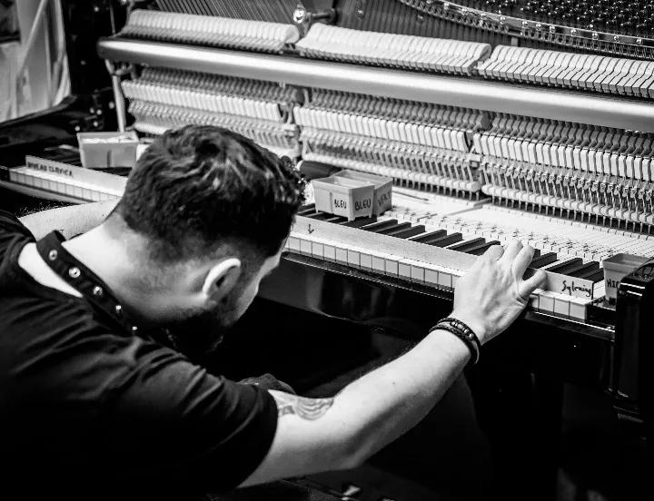 piano technicians at work
